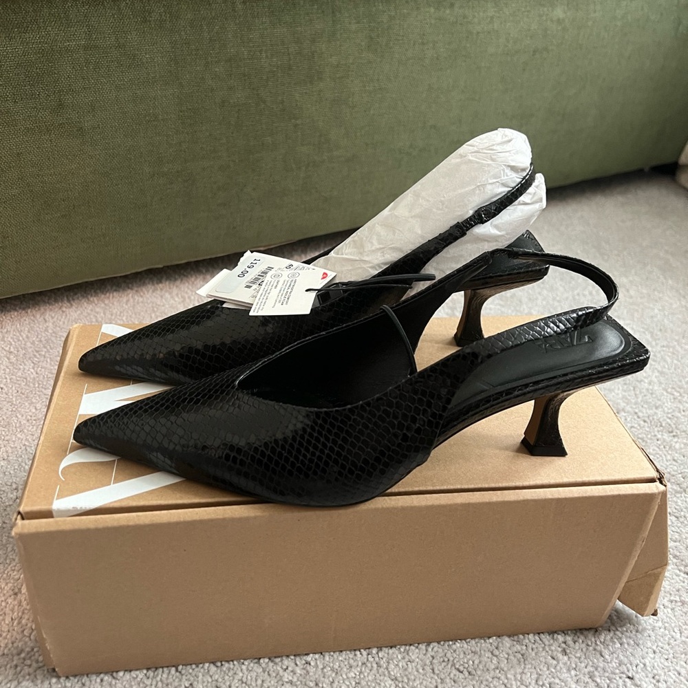 NWT; size 9 (euro 40); animal texture slingback heels